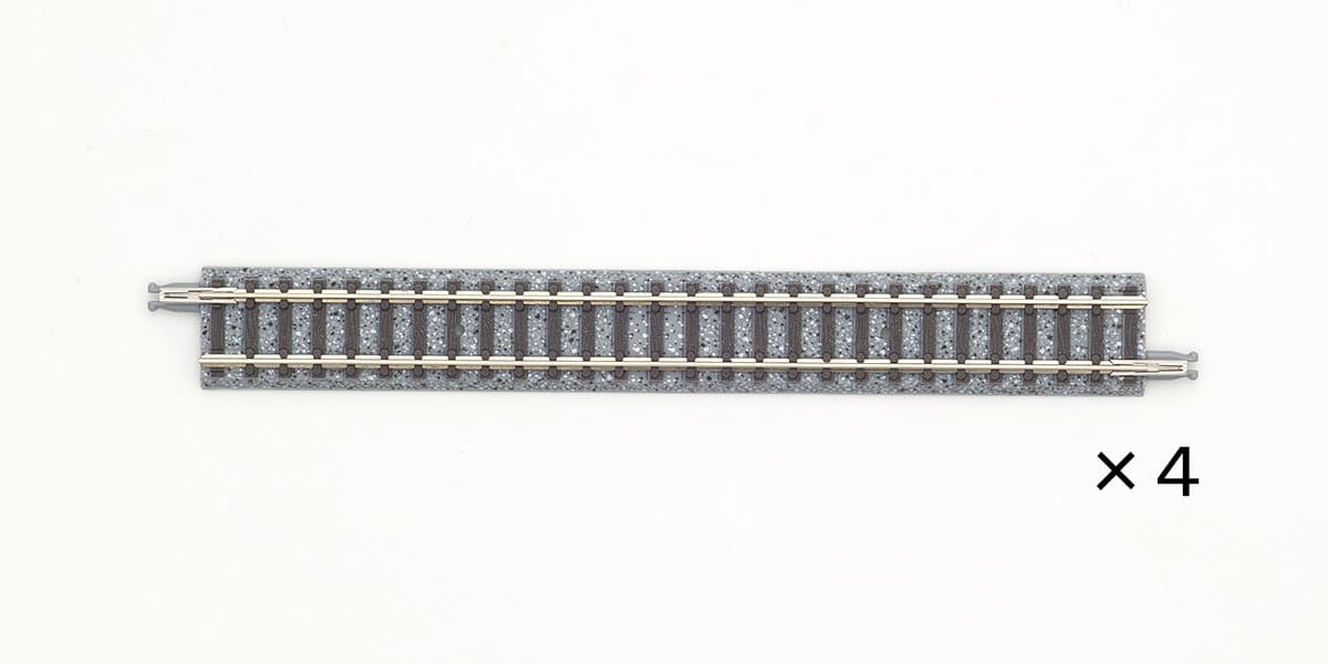 A TOMIX Fine Track 140 mm straight section, grey roadbed