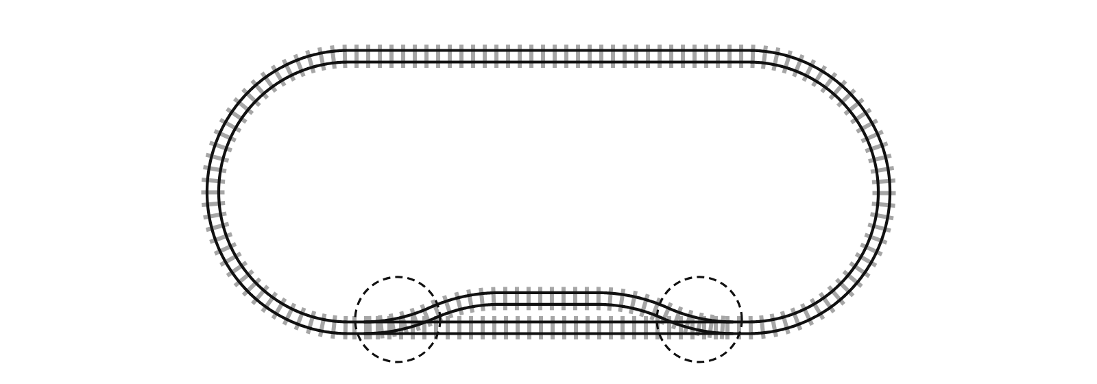 A longer oval with a parallel passing siding on the inside of the bottom straight, connected by two turnouts that are circled